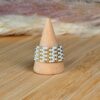 anillo-tejido-blanco-dorado-jociva-accesorios-para-mujer-zoom